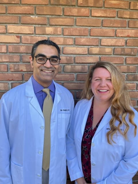 Dr. Sajiv Gugneja and Colleen Janness, PA-C, the dermatology providers at Consultants in Dermatology